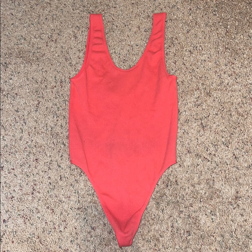 Pink body suit